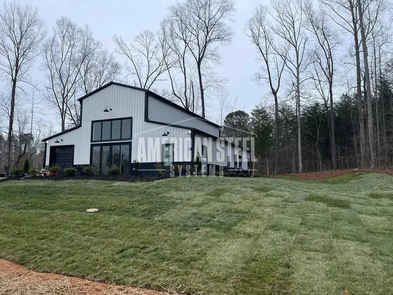 Side Elevation of the White and Black Custom Barndominium